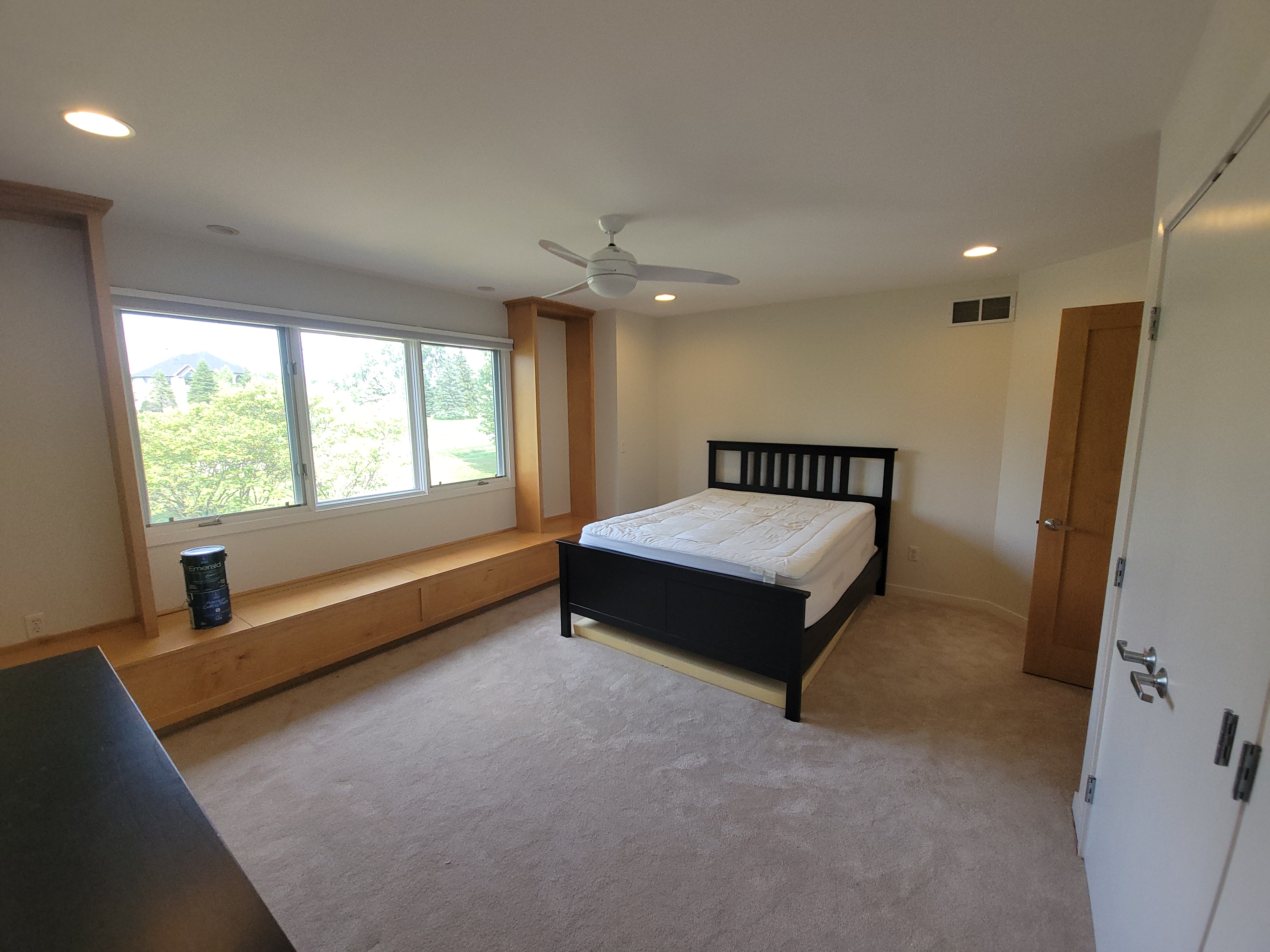 Freshly painted interior with crisp trim and hardwood floors