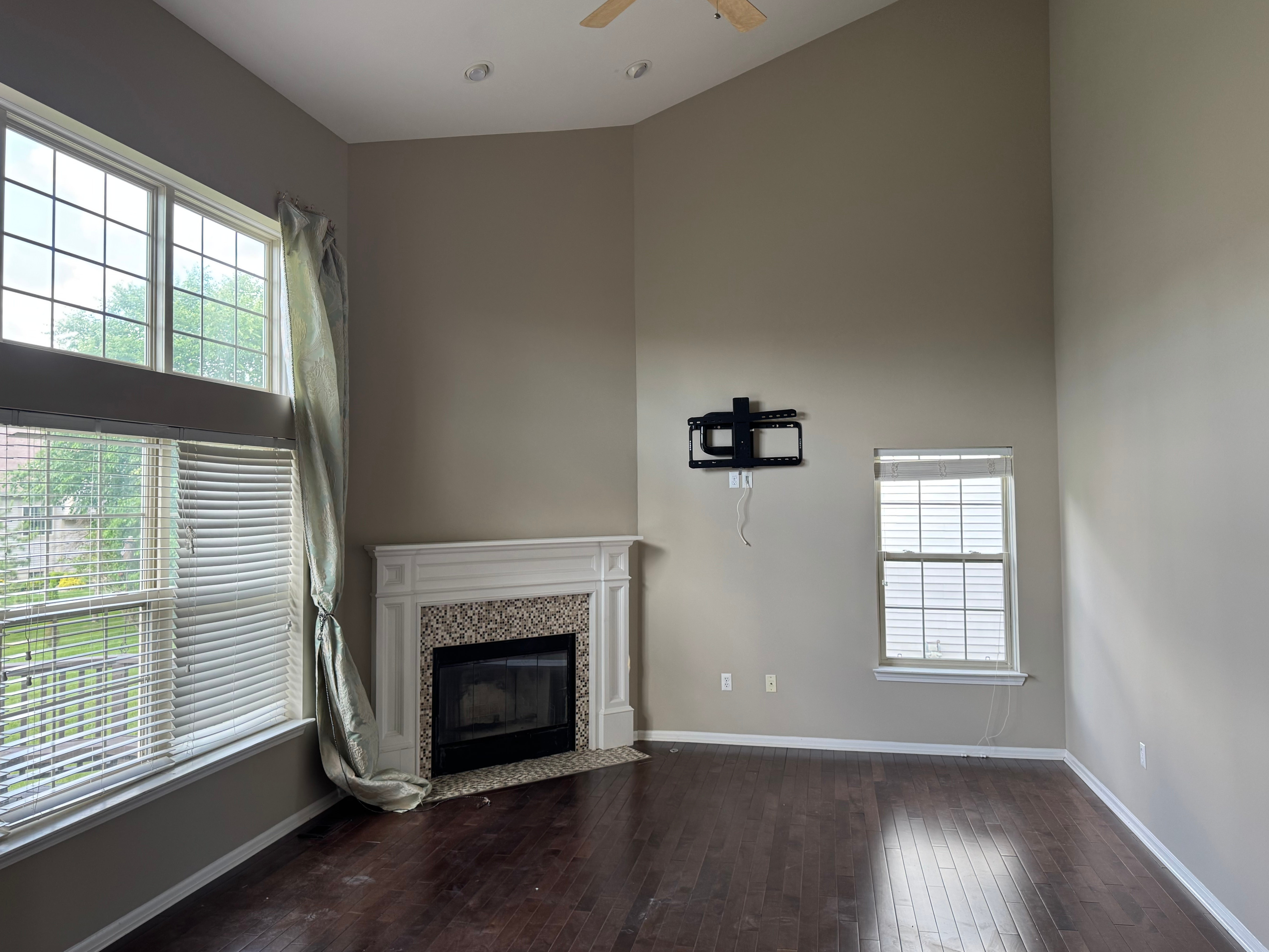 Freshly painted interior with crisp trim and hardwood floors
